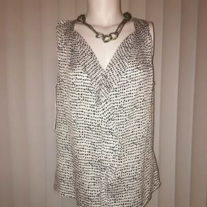 ANN TAYLOR BLOUSE WITH RUFFLE ON THE FRONT. CUTE AND COMFORTABLE. LIKE NEW.